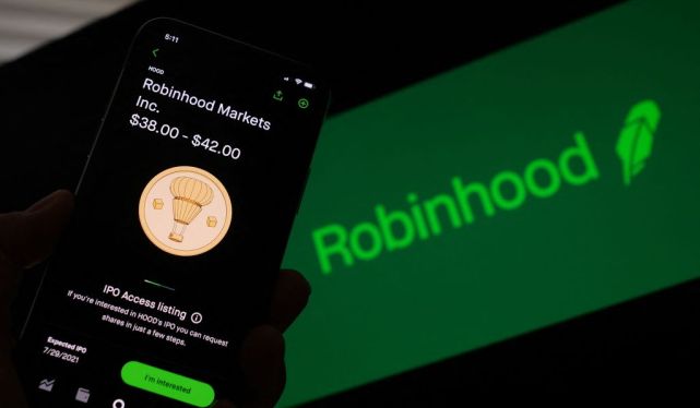 Robinhood app on a phone with Robinhood logo in background