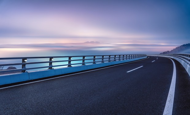 Guardrails on both sides of a road over a viaduct.