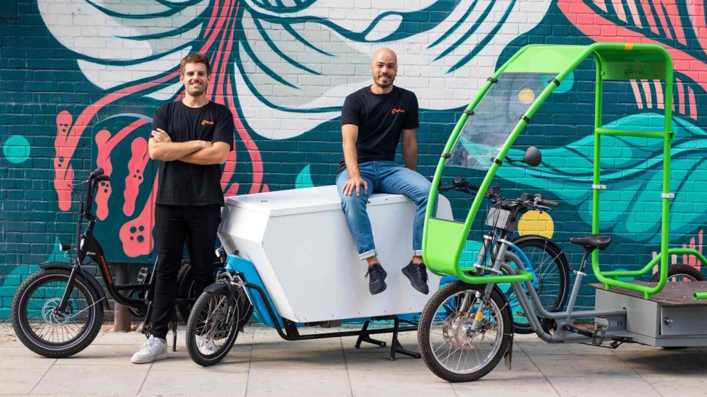 2 guys with e-bike and bike delivery