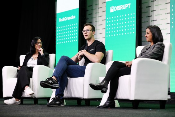 Image of TechCrunch's Mary Ann Azevedo; Henrique Dubugras, co-founder and co-CEO of Brex; and Anu Hariharan, YC’s managing director for continuity and an early Brex investor, speak on stage during TechCrunch Disrupt 2022.