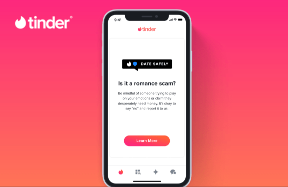 Tinder scam alerts display on cell phone