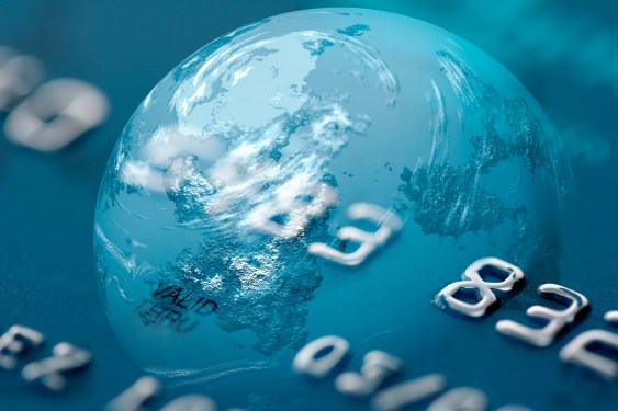 Globe reflected in a credit card