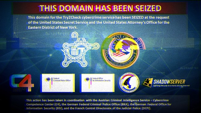 A moshed photo of the DOJ's seizure notice on Try2Check's website