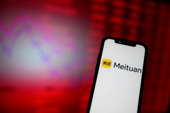 The Meituan logo on smartphone