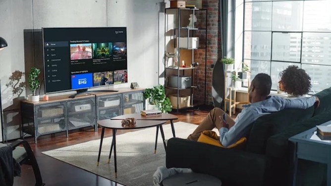 couple on couch watching TV