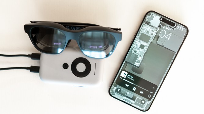 Xreal Air and Beam augmented reality glasses and dongle with iPhone 15 Pro