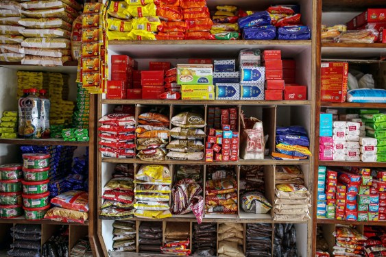 Stocked shelves in India kirana store