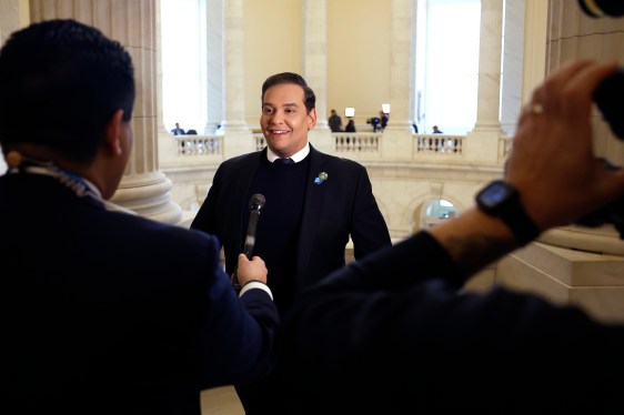 Rep. George Santos (R-NY) is interviewed by television news reporters in the rotunda of the Cannon House Office Building