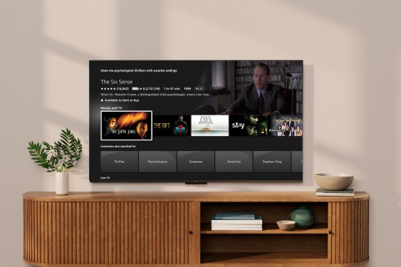 Fire TV on large TV atop credenza