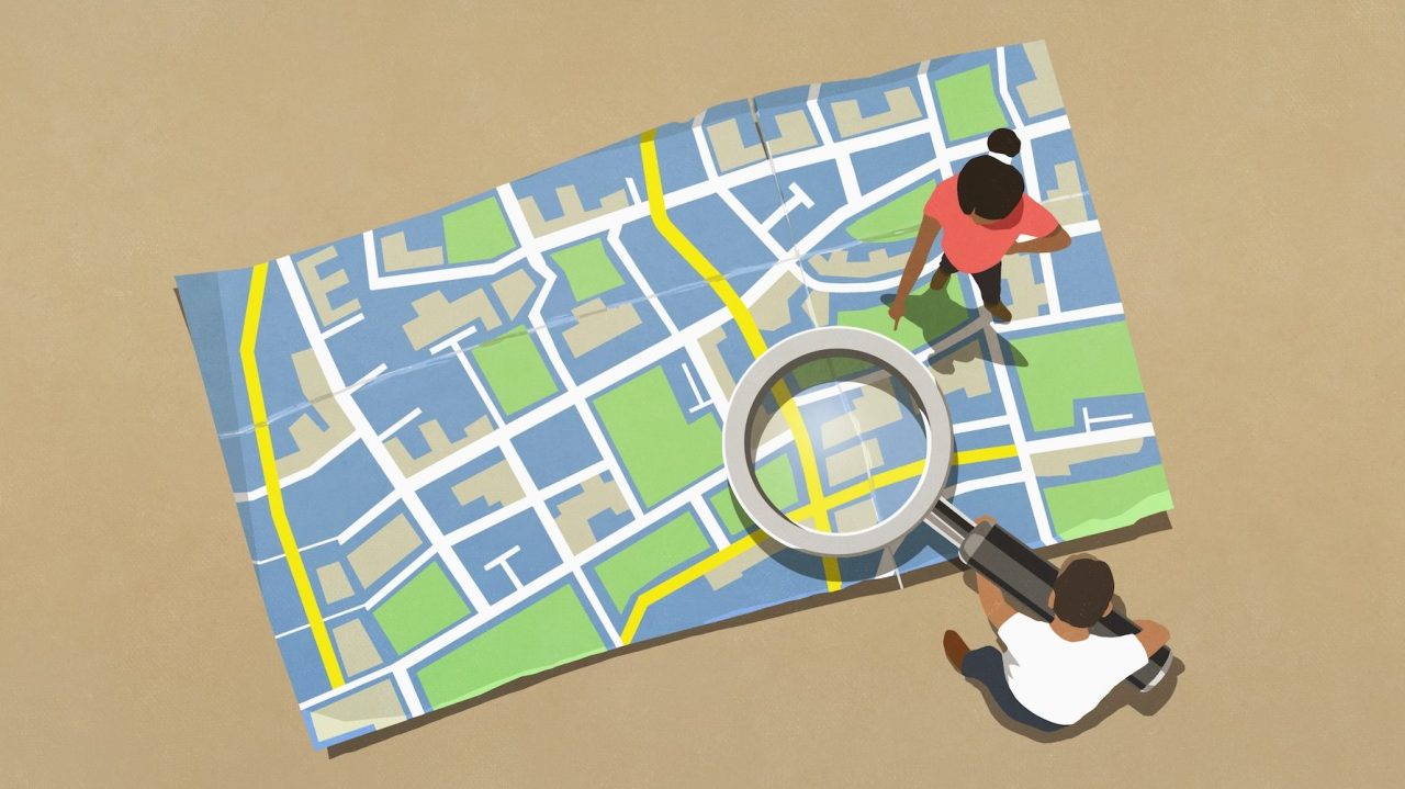 Magnifying glass over map