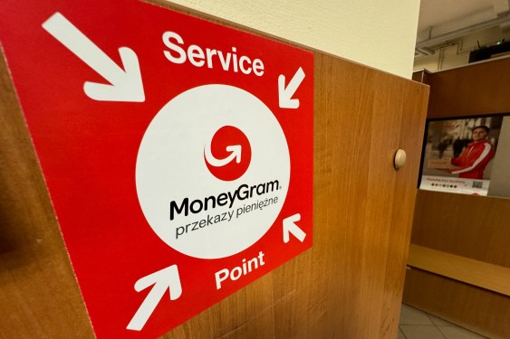 MoneyGram service point sticker is seen at the post office in Krakow, Poland on January 2, 2023. (Photo by Jakub Porzycki/NurPhoto via Getty Images)