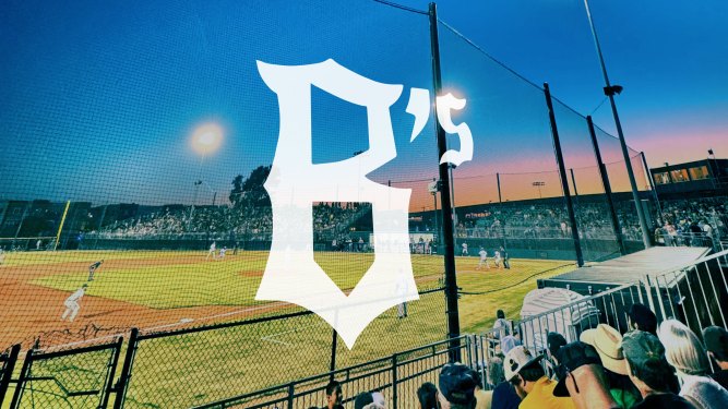 a giant white B's logo in front of a stadium