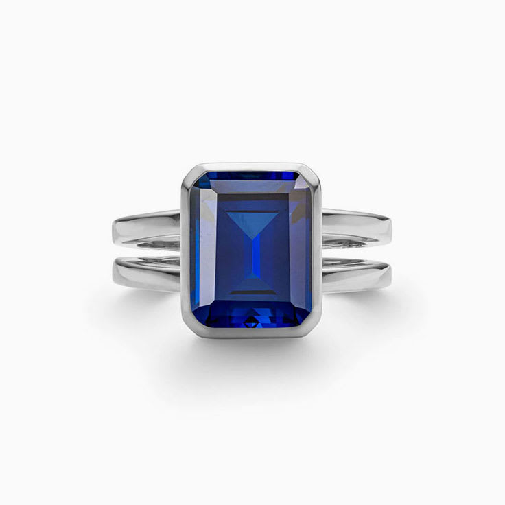 Emerald Cut Sapphire On Split Shank Band