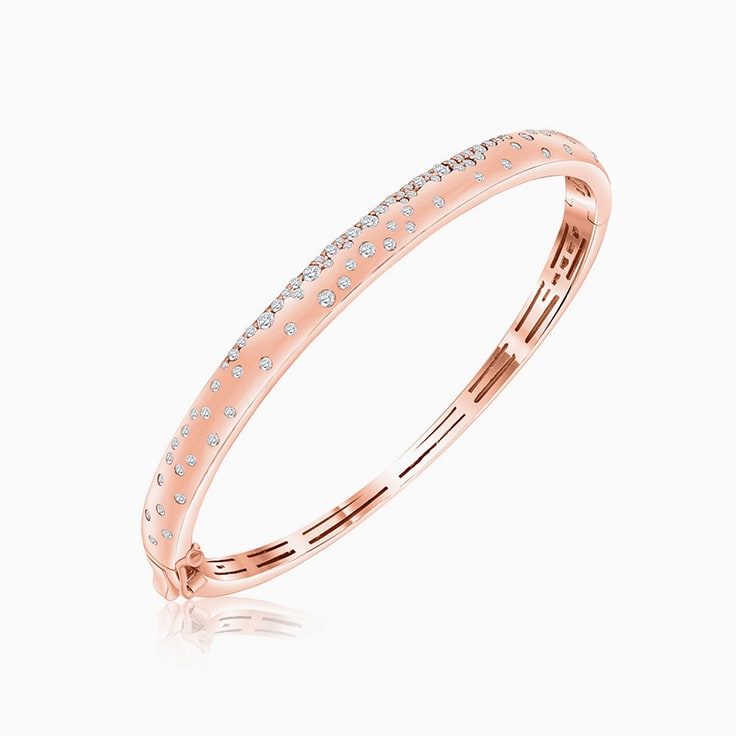 Gold bangle with diamonds