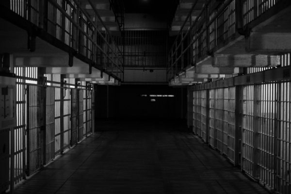 This is a black-and-white image of prison cells in Alcatraz Prison in California.