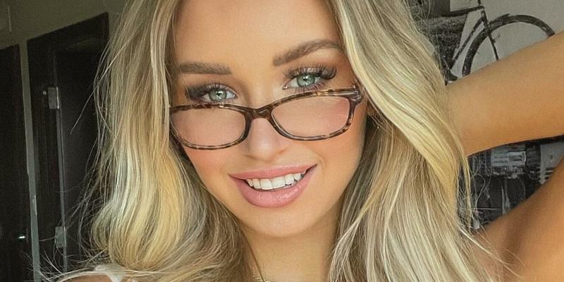 Mikayla Demaiter poses in glasses