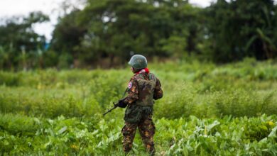 A Myanmar soldier stands guard