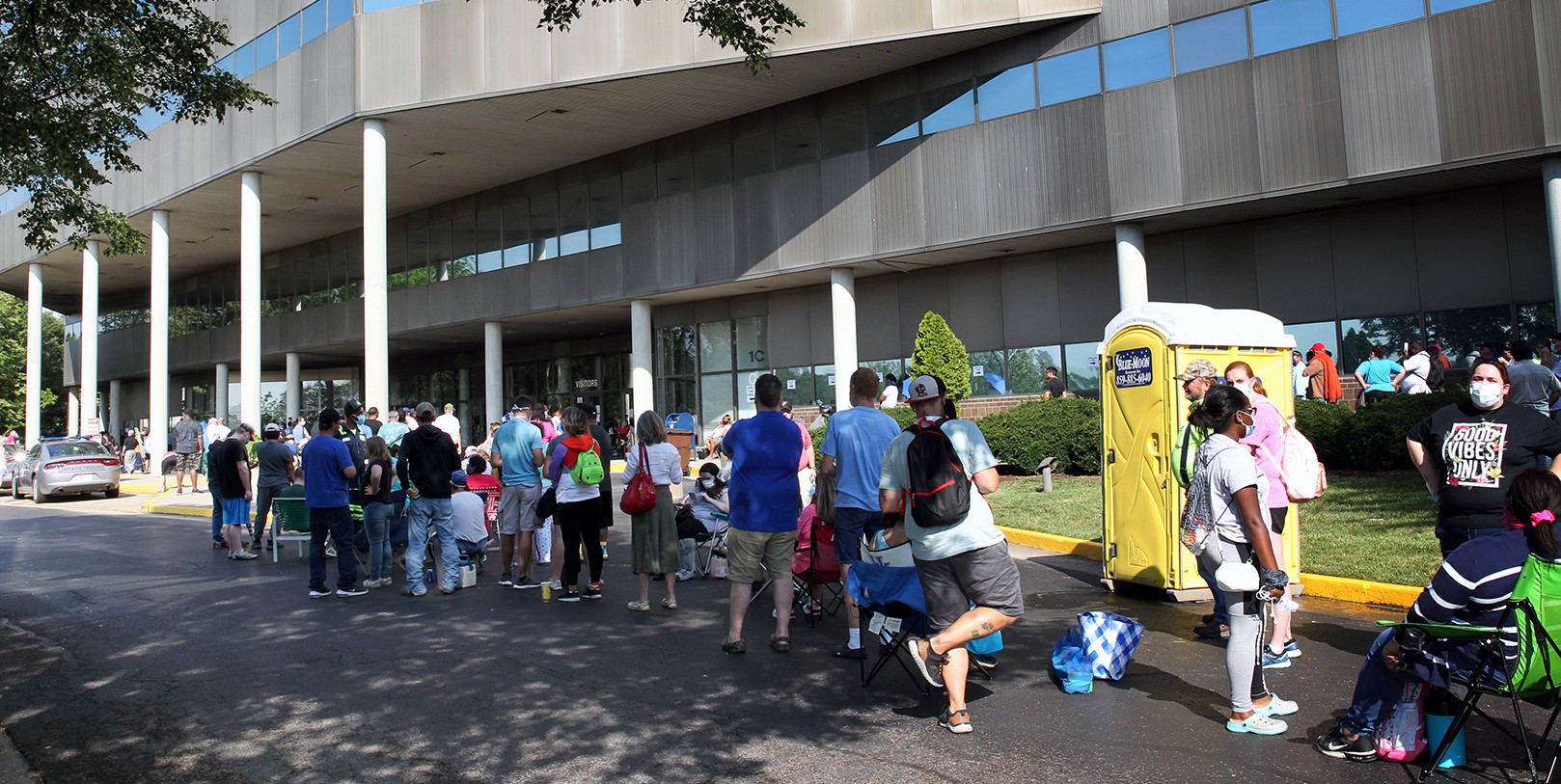 FRANKFORT, KY - JUNE 19: Hundreds of unemployed Kentucky residents wait in long lines outside the Kentucky Career Center for help with their unemployment claims on June 19, 2020 in Frankfort, Kentucky. (Photo by John Sommers II/Getty Images)