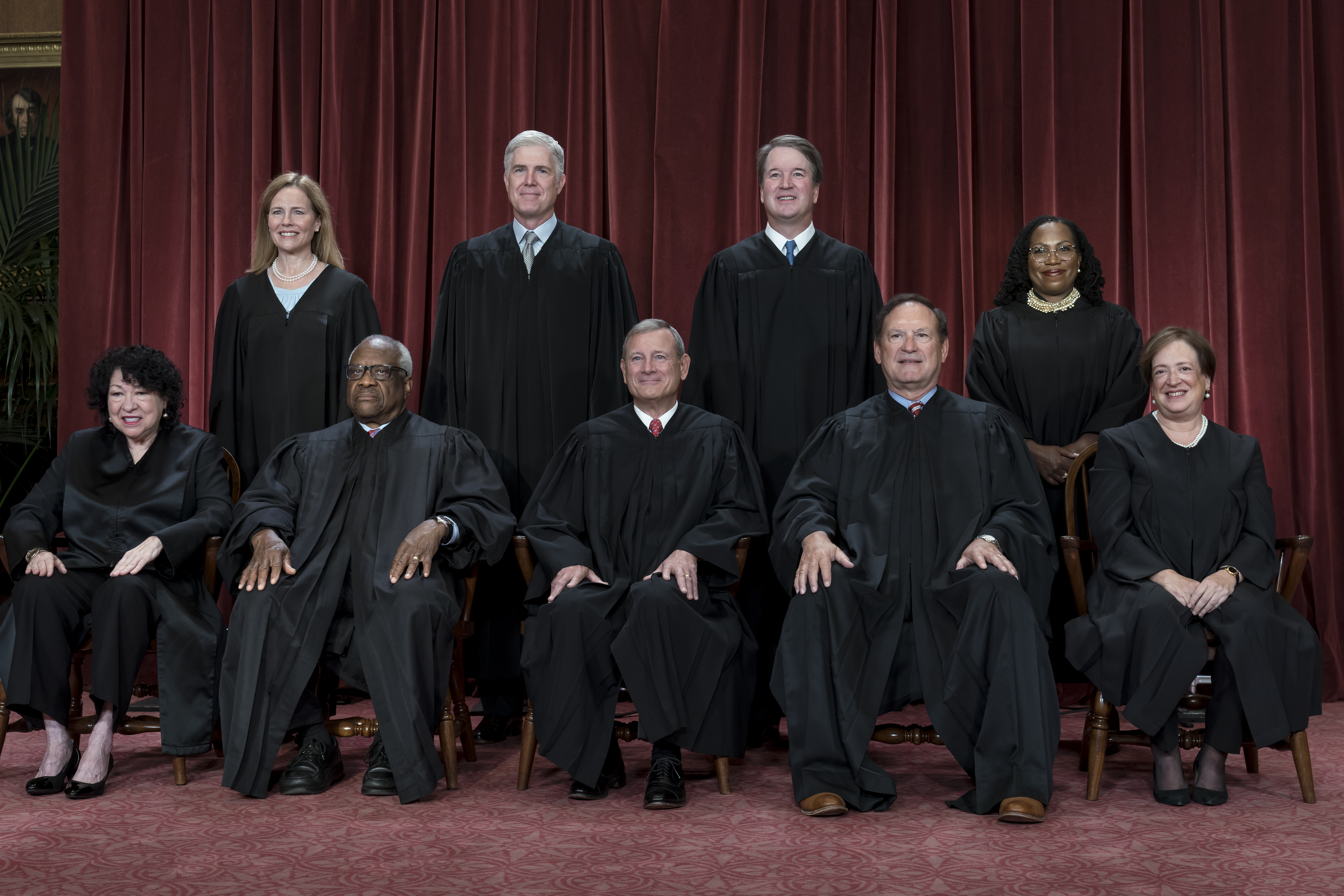 Members of the Supreme Court sit for a group portrait at the Supreme Court building in Washington, Oct. 7, 2022.