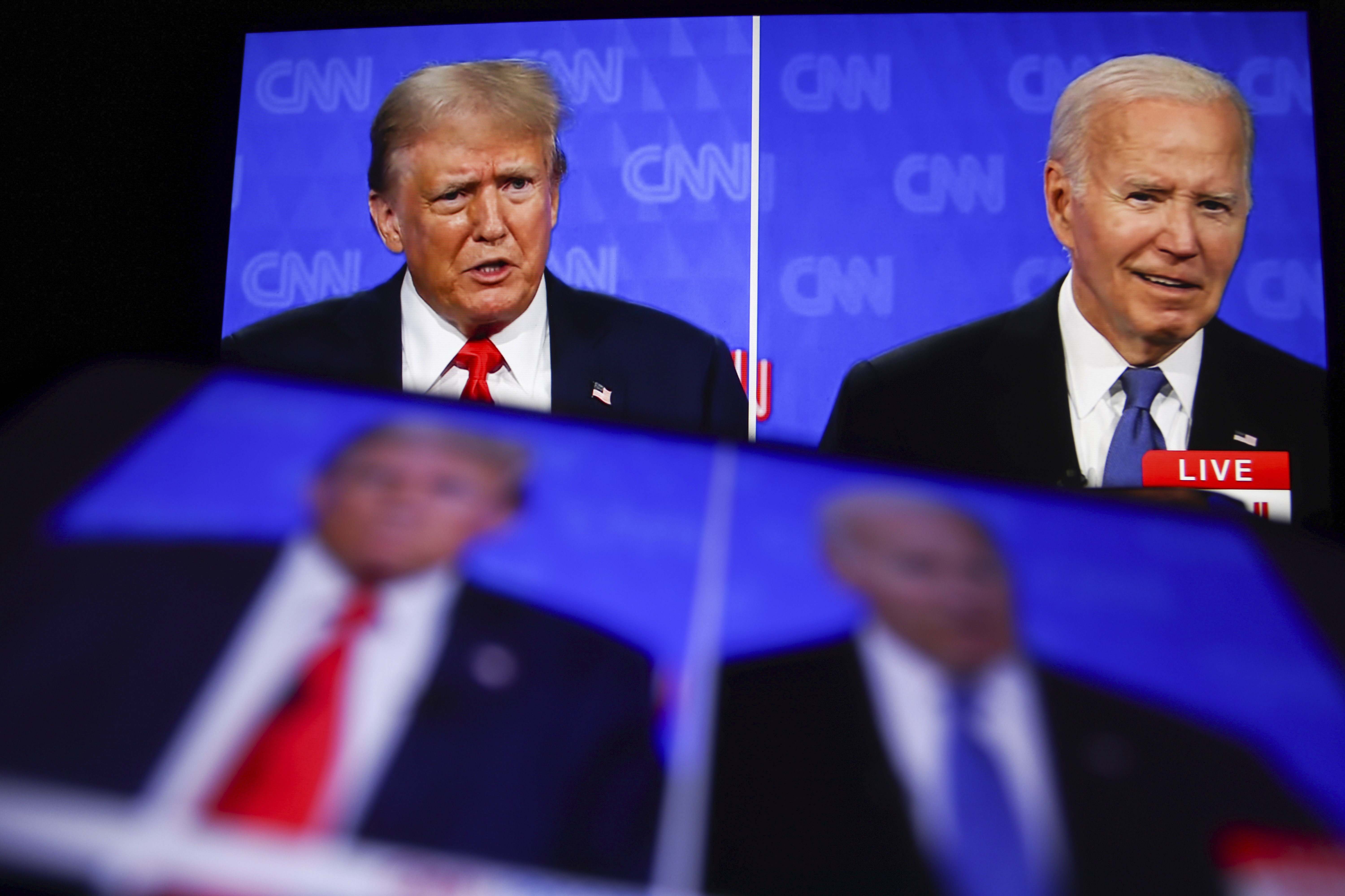 This photo taken from a screen shows the first presidential debate between President Joe Biden and former President Donald Trump in the CNN studio in Atlanta.