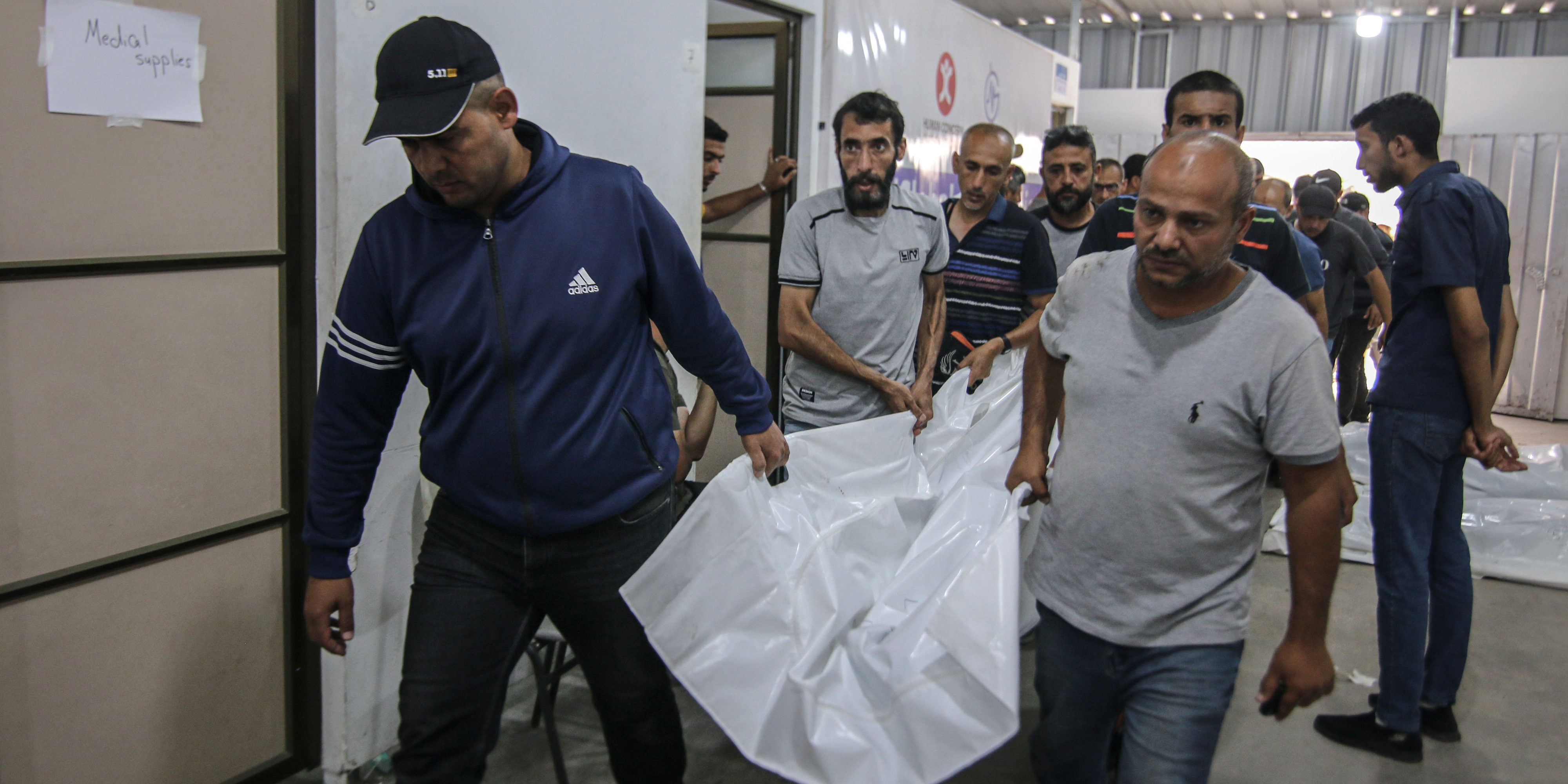 (EDITORS NOTE: Image depicts death.) The bodies of Palestinians killed during an Israeli strike on an area designated for displaced people, at the Tel al-Sultan clinic in Rafah, southern Gaza Strip, on Monday, May 27, 2024. At least 40 Palestinians were killed in an Israeli airstrike at a camp for displaced people in the southern city of Rafah late Sunday, the Hamas-run ministry of health said. Photographer: Ahmad Salem/Bloomberg via Getty Images