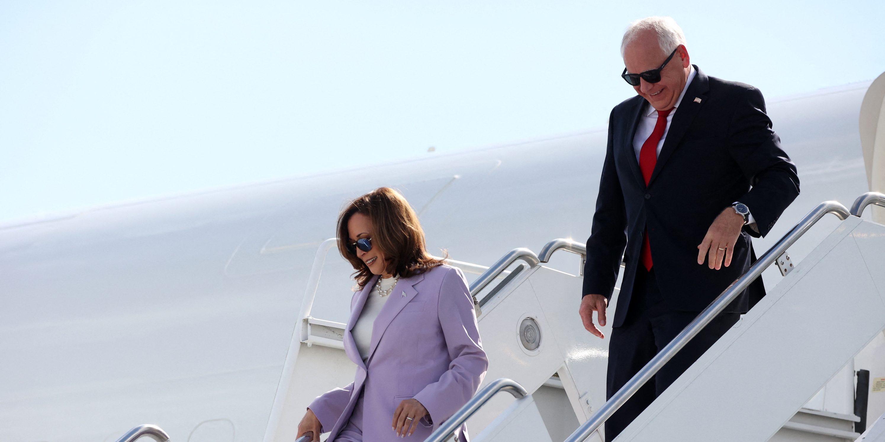 Vice President Kamala Harris and Minnesota Gov. Tim Walz getting off Air Force Two on their wya to campaign events in Las Vegas, Nevada, on Aug. 10, 2024.