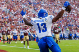 <strong>Memphis running back Greg Desrosiers Jr. (13) celebrates scoring his team's first touchdown against Florida State during the first half of an NCAA college football game, Saturday, Sept. 14, 2024, in Tallahassee, Fla.</strong> (Colin Hackley/AP Photo)