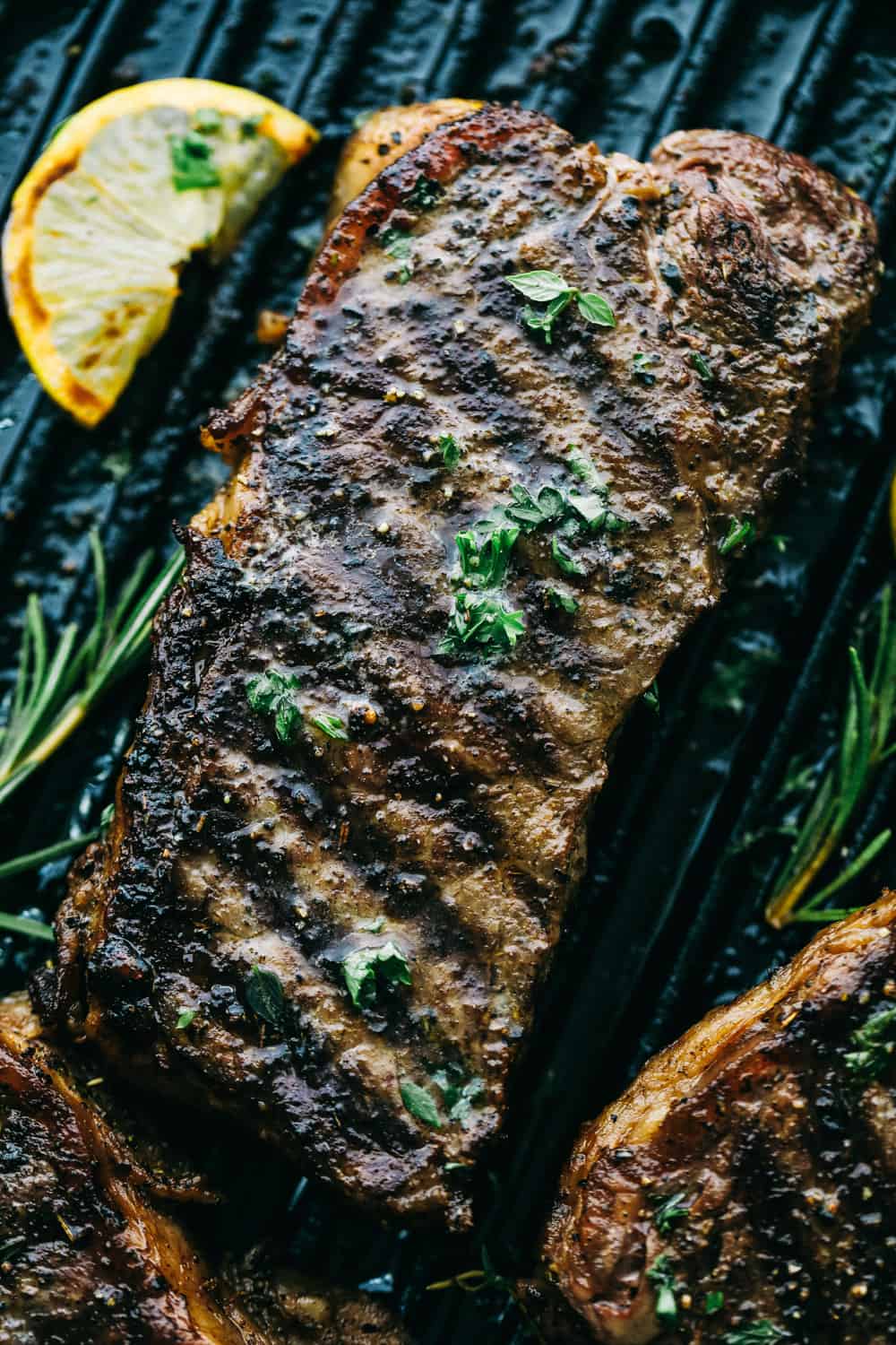 Finished steak on a grill pan.