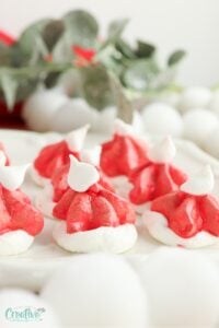 The subtle sweetness of these Christmas meringue cookies makes them a perfect light treat amidst the richer fare typically enjoyed during the holidays.