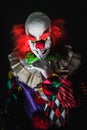 Scary clown on a dark background