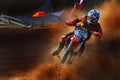 a rugged motorcycle rider is taking a sharp turn in the motocross tournament