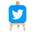 Twitter logo placed on wooden easel