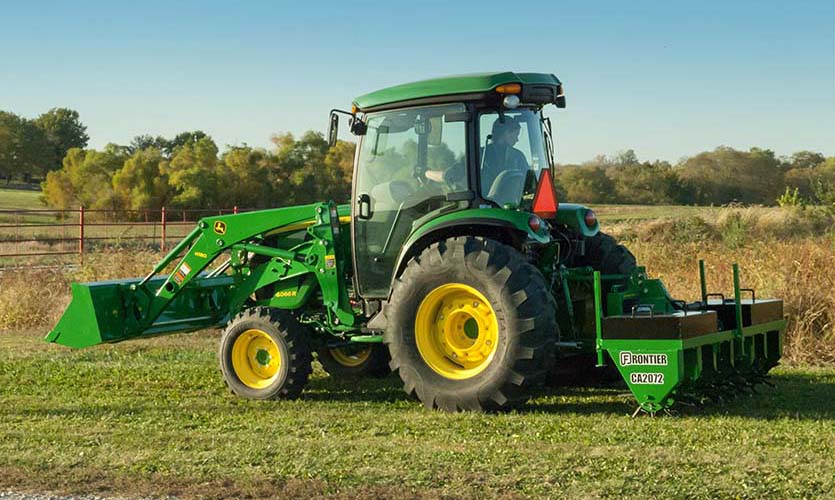 Using a Frontier CA2072 core aerator to aerate, fertilize and over seed.