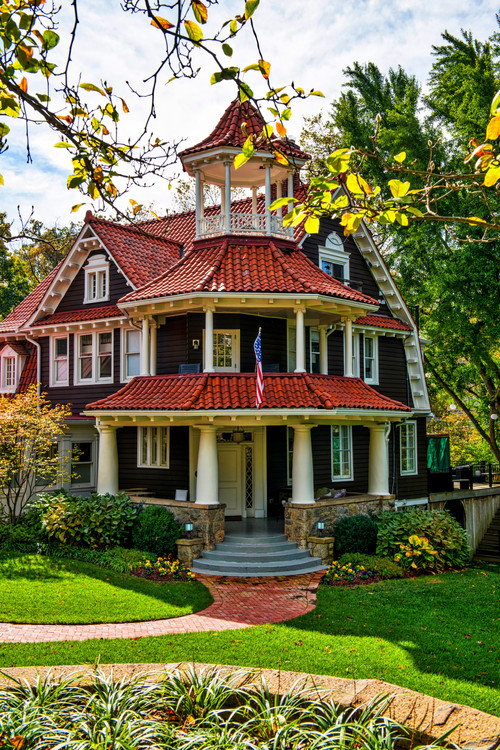 Beautiful Brown Victorian with Red Roof