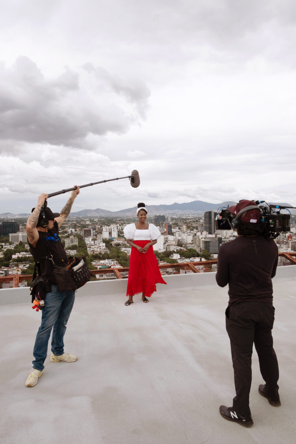 Oneika Raymond with podcast production crew, mexico city