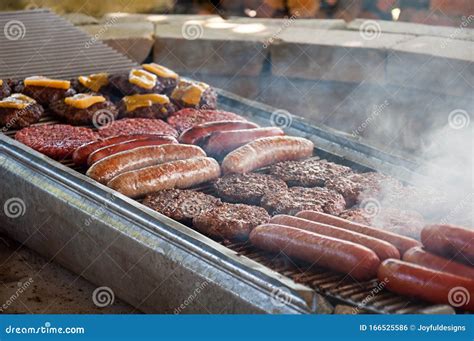 Hamburgers And Hot Dogs On Grill Royalty-Free Stock Image | CartoonDealer.com #98007298