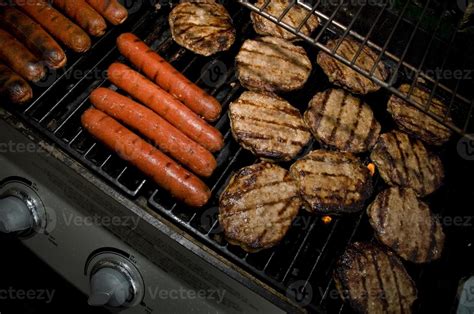 BBQ Burgers and Hot Dogs 803516 Stock Photo at Vecteezy