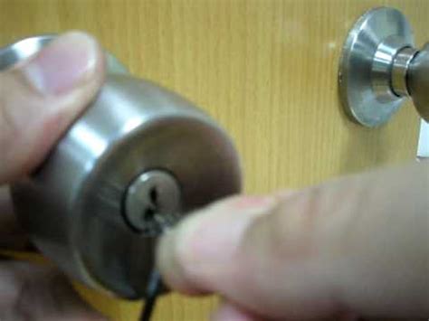 Insert a pair of scissors into the hole of the lock as deeply as you can. pick a door lock with a paper clip - YouTube