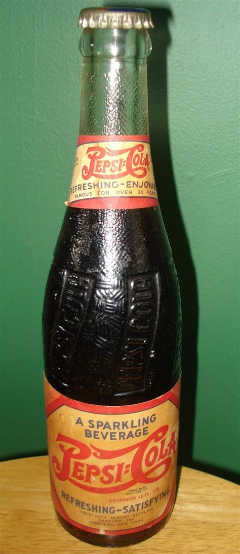 Pepsi is a carbonated soft drink manufactured by pepsico. Vintage Pepsi bottle with paper label, 1930's, 1940's | Pepsi cola, Pepsi, Cola