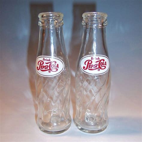 Pepsi is a carbonated soft drink manufactured by pepsico. Vintage Miniature Pepsi Bottles from ruthsredemptions on Ruby Lane