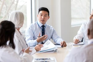 A diverse group of student discussing medical issues 