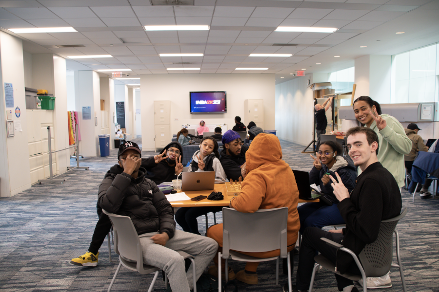 A group of friends hanging out in the open office space of the Campus Center. Photo by Caitlin Feest&#160;(She/Her) / Mass Media Contributor.&#160;