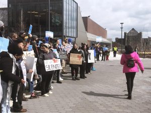 Students and staff outside of Clark Athletic Center protesting the Chancellor's Inauguration last spring. Photo submitted by a participant. 