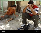 People mourn the death of 22-year-old Reuters photographer Namir Noor-Eldeen and his driver, 40 ...