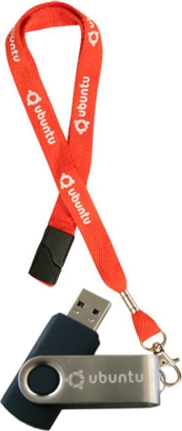 A USB flash drive with a webbing lanyard that includes a safety break-away feature - a predetermined and in this case reattachable segment (in black) meant to prevent accidental strangulation when the lanyard is worn around the neck Ubuntu USB lanyard.jpg