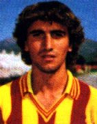 Vintage photo of Pasquale Bruno, a male soccer player, wearing a yellow and red striped jersey with curly brown hair