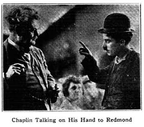 caption="Chaplin Talking on His Hand to Redmond"