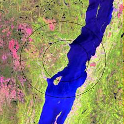 Landsat image of Charlevoix crater. The inner circle marks an early estimate of the diameter of the crater; the outer circle indicates what is now believed to be the real size.