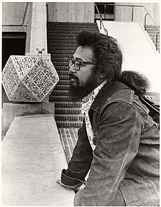 Filipino-American poet and housing advocate Al Robles standing on the bridge in 1975.