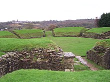 Remains of the Roman amphitheatre at Caerleon, perhaps the oldest purpose built theatrical space in Wales Caerleon Amphitheatre.jpg